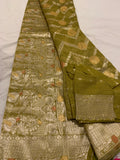 Banarasi linen saree with zari border with matching stitched blouse.